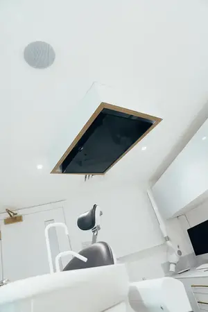 Ceiling-mounted TV for patient comfort